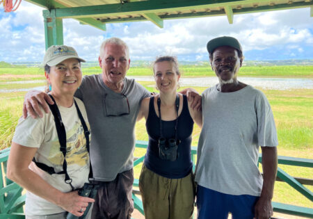 Group photo in hut overlooking wetland habitat at Woodbourne Shorebird Refuge, Barbados 